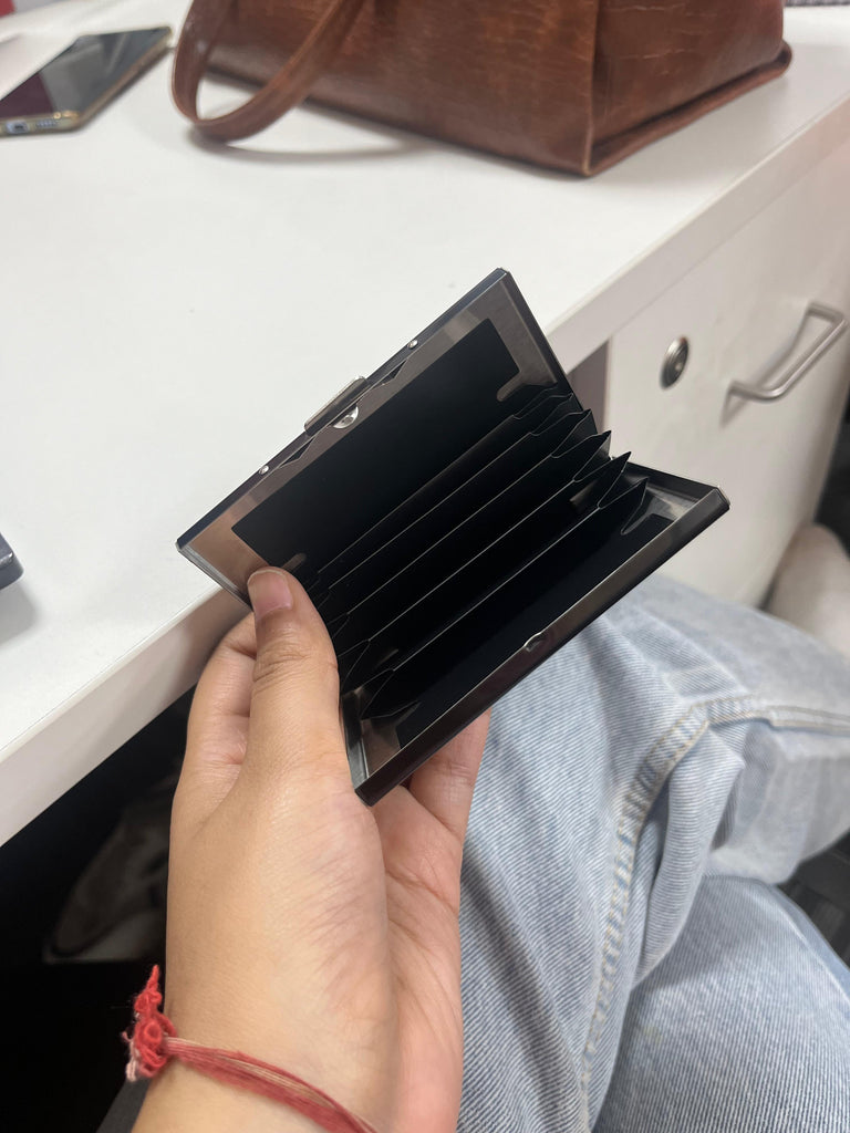 Inside view of an RFID/NFC protected card holder featuring six slots for cards, showcasing its sleek design and functionality.